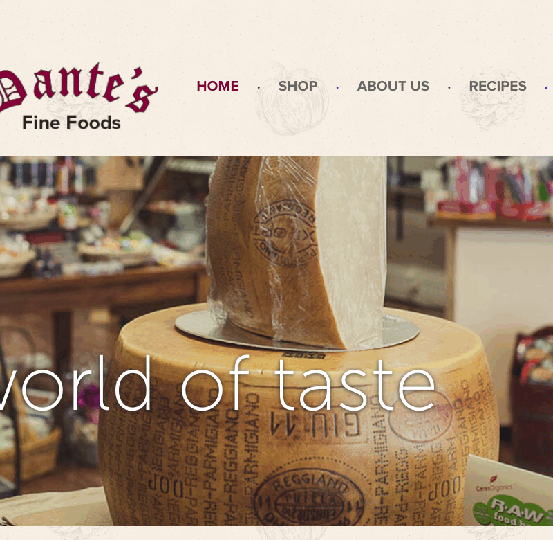 Screenshot of the homepage of Dante's Fine Foods, showing a block of cheese and the tagline "a world of taste"